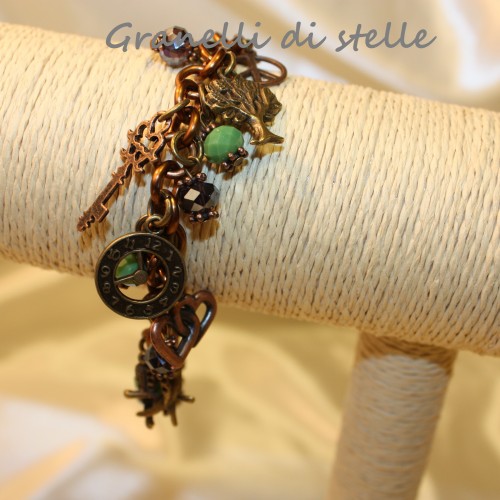 Bracciale artigianale. GRANELLI DI STELLE. CREAZIONI VENDITA NEGOZIO, BIJOUX ARTIGIANALI: ANELLI, BRACCIALI, COLLANE, ORECCHINI, CIONDOLI, SEGNALIBRI, ACCESSORI CERIMONIA, PARURE