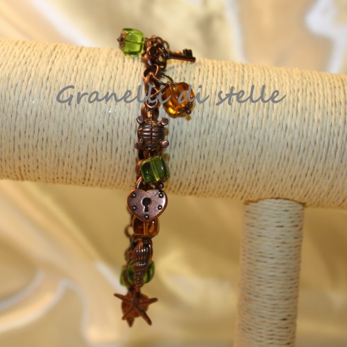 Bracciale artigianale. GRANELLI DI STELLE. CREAZIONI VENDITA NEGOZIO, BIJOUX ARTIGIANALI: ANELLI, BRACCIALI, COLLANE, ORECCHINI, CIONDOLI, SEGNALIBRI, ACCESSORI CERIMONIA, PARURE