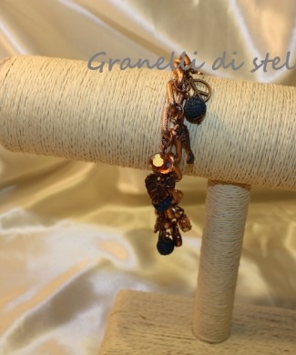 Bracciale artigianale. GRANELLI DI STELLE. CREAZIONI VENDITA NEGOZIO, BIJOUX ARTIGIANALI: ANELLI, BRACCIALI, COLLANE, ORECCHINI, CIONDOLI, SEGNALIBRI, ACCESSORI CERIMONIA, PARURE