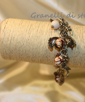 Bracciale artigianale. GRANELLI DI STELLE. CREAZIONI VENDITA NEGOZIO, BIJOUX ARTIGIANALI: ANELLI, BRACCIALI, COLLANE, ORECCHINI, CIONDOLI, SEGNALIBRI, ACCESSORI CERIMONIA, PARURE