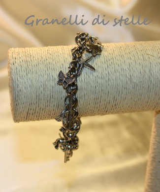 Bracciale artigianale. GRANELLI DI STELLE. CREAZIONI VENDITA NEGOZIO, BIJOUX ARTIGIANALI: ANELLI, BRACCIALI, COLLANE, ORECCHINI, CIONDOLI, SEGNALIBRI, ACCESSORI CERIMONIA, PARURE