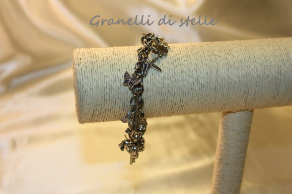 Bracciale artigianale. GRANELLI DI STELLE. CREAZIONI VENDITA NEGOZIO, BIJOUX ARTIGIANALI: ANELLI, BRACCIALI, COLLANE, ORECCHINI, CIONDOLI, SEGNALIBRI, ACCESSORI CERIMONIA, PARURE