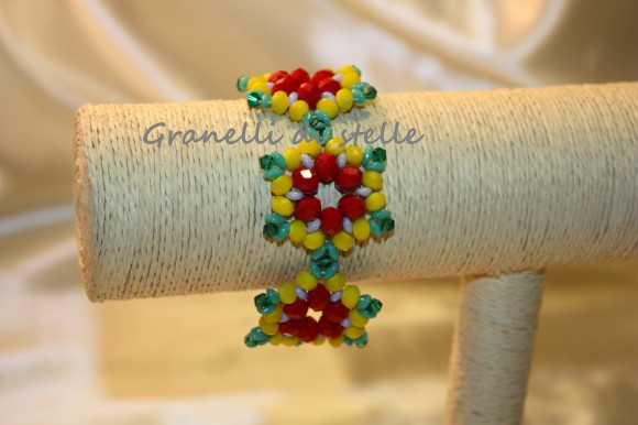 Bracciale artigianale. GRANELLI DI STELLE. CREAZIONI VENDITA NEGOZIO, BIJOUX ARTIGIANALI: ANELLI, BRACCIALI, COLLANE, ORECCHINI, CIONDOLI, SEGNALIBRI, ACCESSORI CERIMONIA, PARURE